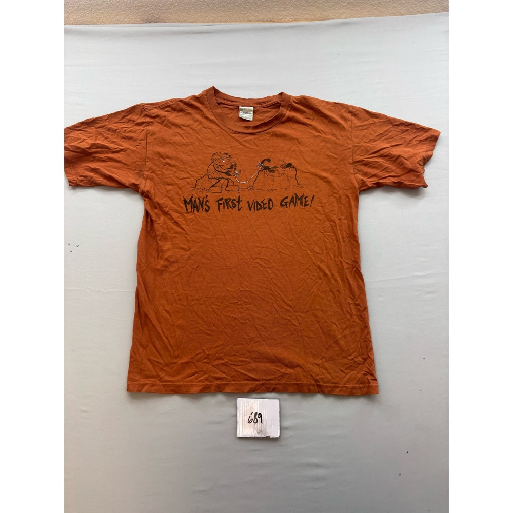 Cygnus Mans First Video Game Graphic Tee Burnt Orange Cotton Shirt Mens Medium
